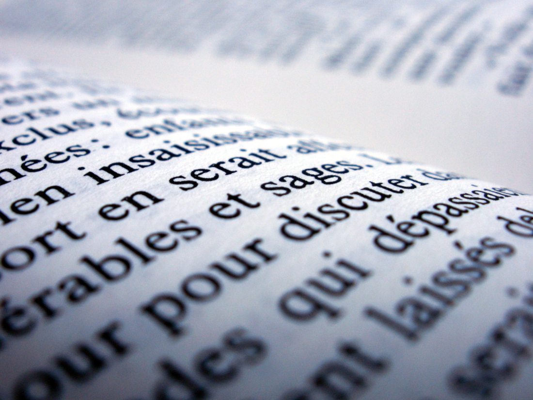 Close up of page of book in french focusing on the word "serait"